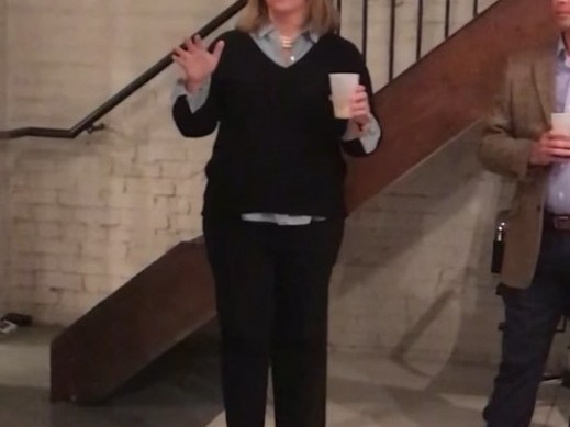 Kate McKinney Speaking at an Event
